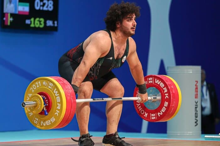 تعجب قهرمان نامدار المپیک از ملاقات با وزنه‌بردار زنجانی/ دوقلوهای ایرانی - قطری در کلمبیا! + عکس