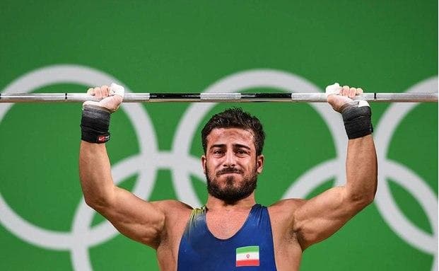 آیا کیانوش رستمی از ایران مهاجرت کرده؟ / این ورزشکار در مسابقات آینده برای چه کشوری وزنه می‌زند؟